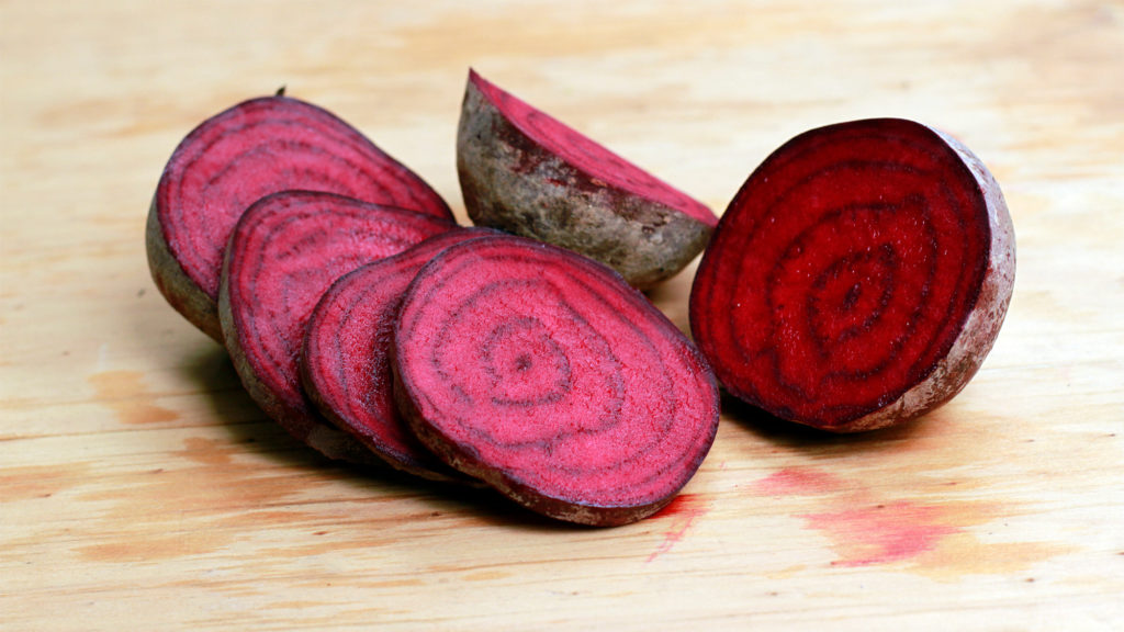 Sliced red beets on a cutting board for a healthy lifestyle Complete Healthcare Primary Care and Gynecology